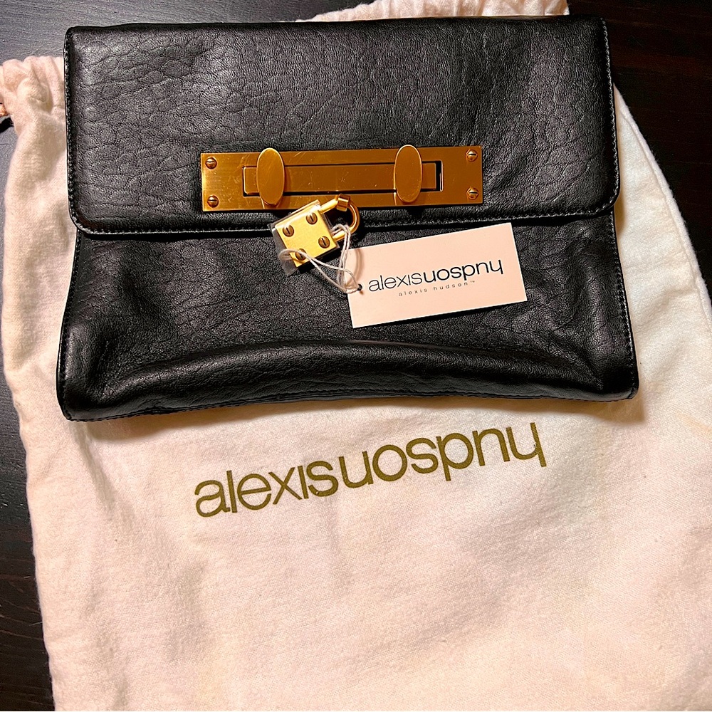 Alexis Hudson Black Leather Clutch ! New with tags! 7 in x 10 inches.